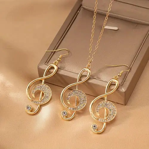 Set de Collar y arete de Clave de sol, Dorado