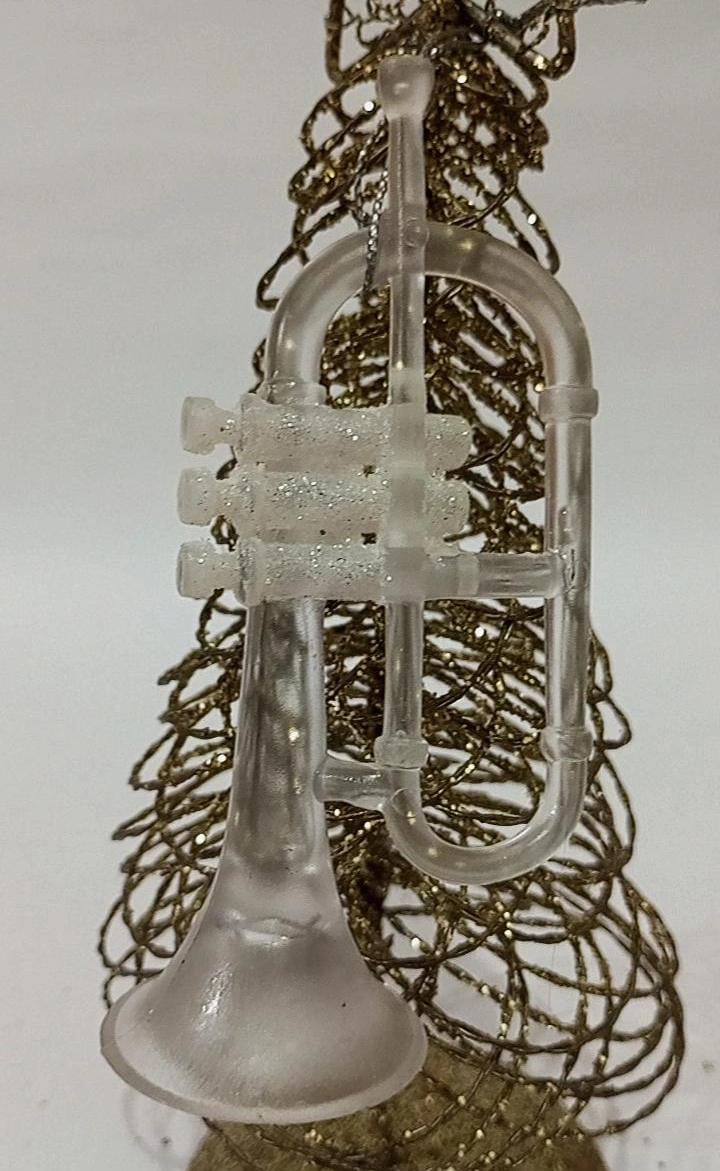 Adornos de navideño en forma de intrumentos musicales