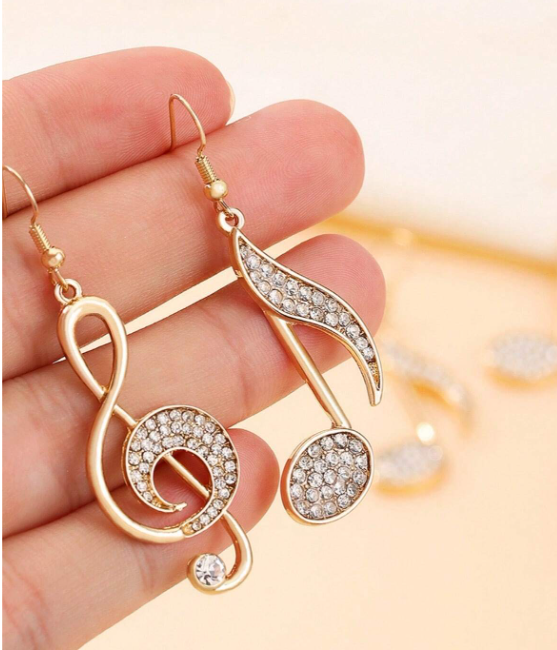 Aretes de clave de sol y nota musical