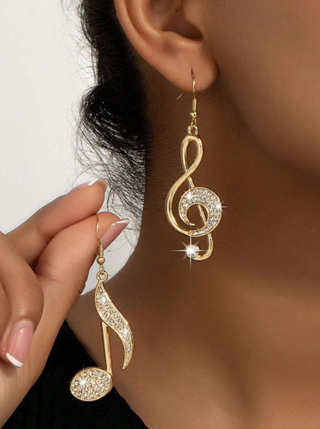 Aretes de clave de sol y nota musical