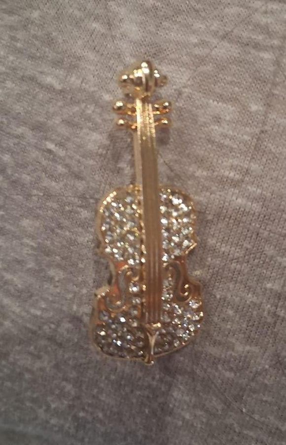 Broche  de cello