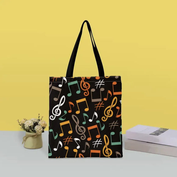 Bolso con diseño de notas musicales y de piano