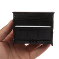 Tope de lapiz en forma de Piano Vertical